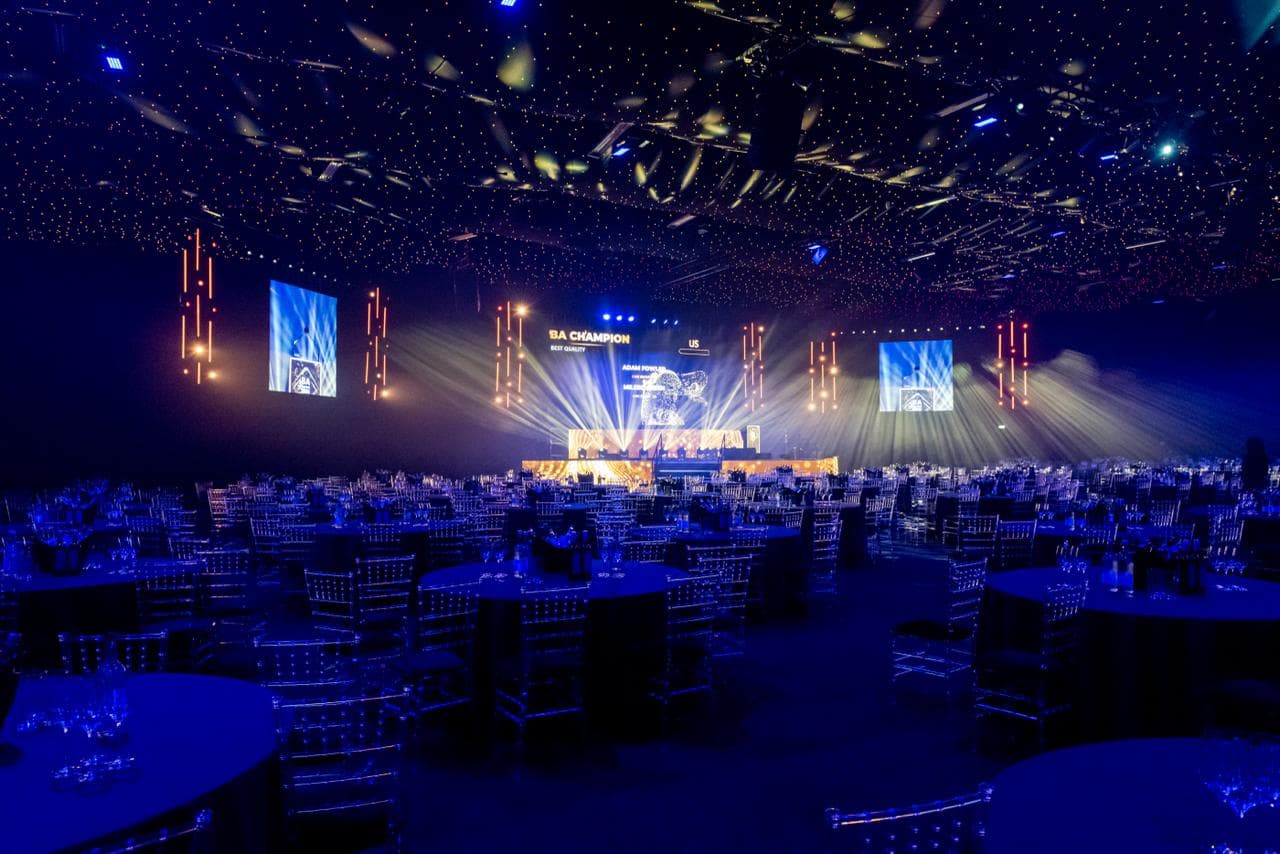 BA Champion gala venue with round tables and decorations